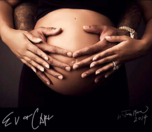 INSTALOVE: Evelyn Lozada Shares Photo of Herself & Fiance Carl Crawford Embracing Her Baby Bump